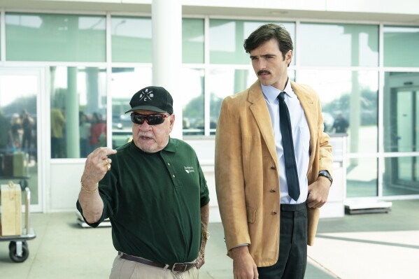 This photo released by Kino Lorber shows filmmaker Paul Schrader, Left, with actor Jacob Elordi on the set of "Oh, Canada." (Jeong Park/Kino Lorber via AP)