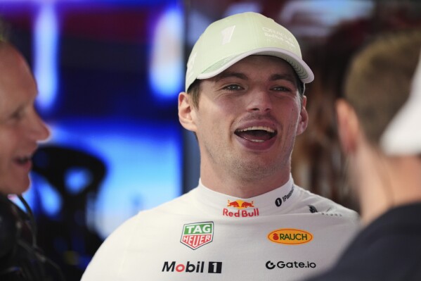 Red Bull driver Max Verstappen of the Netherlands stands in the pits during a practice session for the Formula One Miami Grand Prix auto race, Friday, May 2, 2025, in Miami Gardens, Fla. (AP Photo/Rebecca Blackwell)