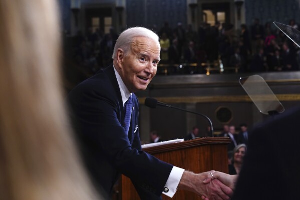 President Joe Biden shakes hands after delivering the State of the Union address to a joint session of Congress at the Capitol, Thursday, March 7, 2024, in Washington. (Shawn Thew/Pool via AP)