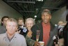 Chicago Bulls Michael Jordan, right, answers reporters questions as he leaves practice at the United Center, Thursday, March 23, 1995, Chicago, Ill. Jordan will play his first game in the New Arena and his first game in Chicago since rejoining the team, March 19, when the Bulls play the Orlando Magic on Friday, March 24. (AP Photo/Tim Boyle)