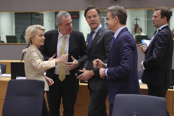 European Commission President Ursula von der Leyen, left, speaks with Greece's Prime Minister Kyriakos Mitsotakis, second right, and Netherland's Prime Minister Mark Rutte, center, during a round table meeting at the EU-ASEAN summit in Brussels, Wednesday, Dec. 14, 2022. EU and ASEAN leaders meet in Brussels for a one day summit to discuss the EU-ASEAN strategic partnership, trade relations and various international topics. (AP Photo/Olivier Matthys, Pool)