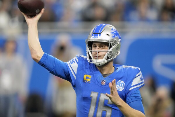 FILE - Detroit Lions quarterback Jared Goff passes against the Tampa Bay Buccaneers during the first half of an NFL football NFC divisional playoff game, Sunday, Jan. 21, 2024, in Detroit. A person familiar with the situation says the Lions and Goff have agreed to a $212 million, four-year contract extension. The person tells Ǻ, Monday, May 13, 2024, that the deal includes $170 million in guarantees, speaking on condition of anonymity because the terms were not announced. (Ǻ Photo/Carlos Osorio, File)