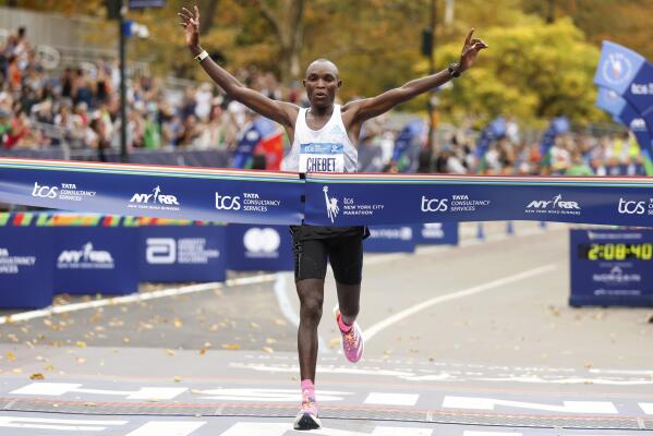 Chebet and Lokedi of Kenya win NYC Marathon races in debuts | AP News