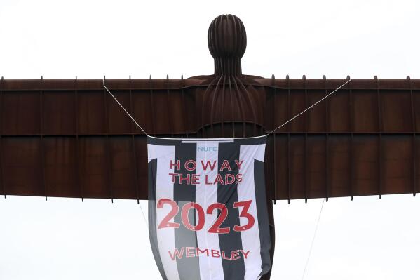 A view of the Angel of the North, with a message attached, ahead of the EFL Cup soccer match between Newcastle United and Manchester United played at Wembley on Sunday, in Gateshead, England, Saturday, Feb. 25, 2023. (AP Photo/Scott Heppell)