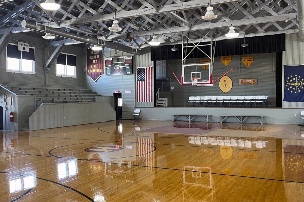 The Hoosier Gym is shown Monday, Feb. 19, 2024, in Knightstown, Ind. Thousands of people still visit The Hoosier Gym annually. The gym where many scenes from the movie “Hoosiers” was filmed in the mid-1980s plays host to dozens of high school games each year as fans still flock to the site. (AP Photo/Tim Reynolds)