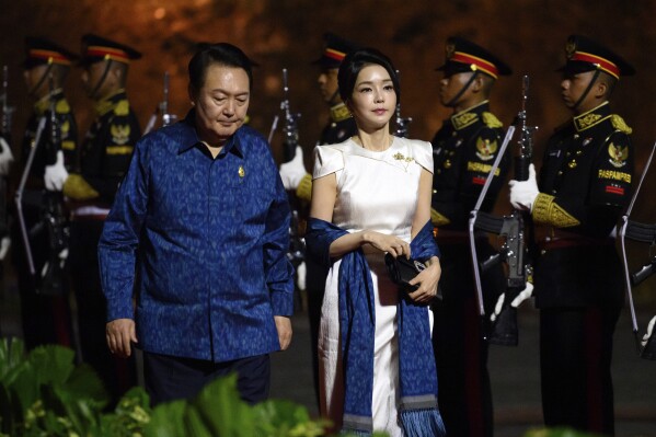 South Korean President Yoon Suk-Yeol and First Lady Kim Keon-Hee arrive for an official dinner at the top of the G20, in Nusa Dua, in Indonesia, November 15, 2022. (Photo Leon Neal / Pool via AP, file)