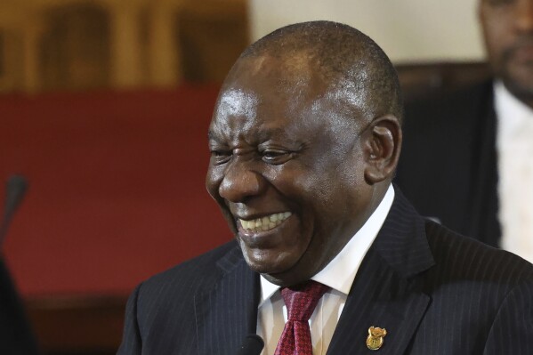 South African President Cyril Ramaphosa smiles as he delivers the state of the nation address in Cape Town, South Africa, Thursday, Feb. 8, 2024. (Esa Alexander/pool photo via AP)