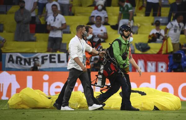 Greenpeace apologises for injuries caused by parachuting protester