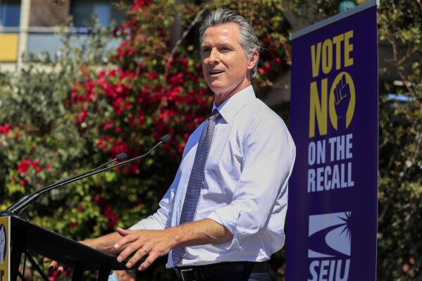 California Gov. Gavin Newsom speaks during a rally at St. Mary's Center in Oakland, Calif., Saturday, Sept. 11, 2021. The last day to vote in the recall election is Tuesday, Sept. 14. A majority of voters must mark "no" on the recall to keep Newsom in office. (Shae Hammond/Bay Area News Group via AP)