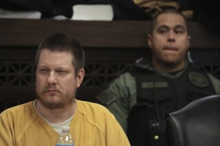 FILE - In this Jan. 18, 2019 file photo, former Chicago police Officer Jason Van Dyke, left, attends his sentencing hearing at the Leighton Criminal Court Building in Chicago, for the 2014 shooting of Laquan McDonald. Van Dyke, the former Chicago police officer imprisoned for the 2014 murder of Laquan McDonald ended an effort to overturn his conviction, Friday, Oct. 9, 2020. (Antonio Perez/Chicago Tribune via AP, Pool, File)