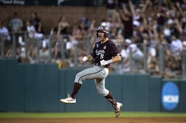 Texas A&M outfielder Hayden Schott (5) celebrates a solo home run against Louisiana during the fifth inning of the Bryan-College Station Regional NCAA baseball game, Sunday, June 2, 2024, in College Station, Texas. (Meredith Seaver/College Station Eagle via AP)