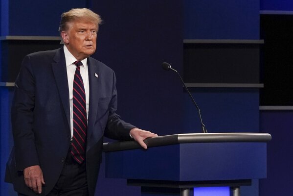 President Donald Trump walks away form the podium at the conclusion of the first presidential debate Tuesday, Sept. 29, 2020, at Case Western University and Cleveland Clinic, in Cleveland, Ohio. (AP Photo/Patrick Semansky)