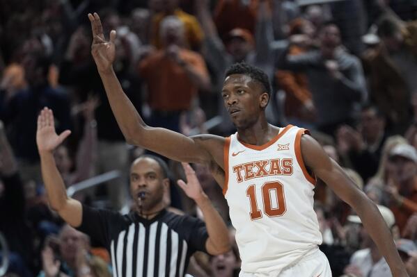 Texas guard Sir'Jabari Rice (10) reacts after scoring against Oklahoma during the second half of an NCAA college basketball game in Austin, Texas, Saturday, Feb. 18, 2023. (AP Photo/Eric Gay)