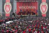 FILE - The commencement address is given during graduation at the University of Wisconsin in Madison, Wis., on May 12, 2018. The Universities of Wisconsin and Assembly Republican Speaker Robin Vos have reached a sweeping deal released Friday, Dec. 8, 2023, that would freeze hiring for diversity positions across the system in exchange for lawmakers approving employee pay raises and funding for a new engineering building at the flagship campus. Vos blocked pay raises and Republicans refused to release money for the engineering building earlier this year. (AP Photo/Jon Elswick, File)