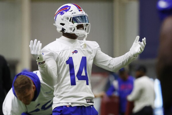 Buffalo Bills wide receiver Stefon Diggs (14) reacts during NFL football practice in Orchard Park, N.Y., Wednesday June 14, 2023. (AP Photo/Jeffrey T. Barnes)