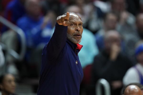 Kansas acting head coach Norm Roberts directs his team in the first half of a first-round college basketball game against Howard in the NCAA Tournament, Thursday, March 16, 2023, in Des Moines, Iowa. (AP Photo/Charlie Neibergall)