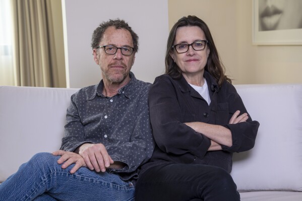 Writer/director Ethan Coen, left, and writer Tricia Cooke pose for a portrait to promote "Drive-Away Dolls" on Tuesday, Feb. 20, 2024, in New York. (Photo by Andy Kropa/Invision/AP)