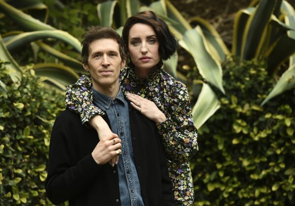 Daryl Wein, left, and his wife Zoe Lister-Jones, the co-directors, co-writers and co-producers of "How It Ends," pose together for a portrait to promote the film for the Sundance Film Festival, Wednesday, Jan. 27, 2021, in Los Angeles. Lister-Jones is also a cast member in the film. (AP Photo/Chris Pizzello)