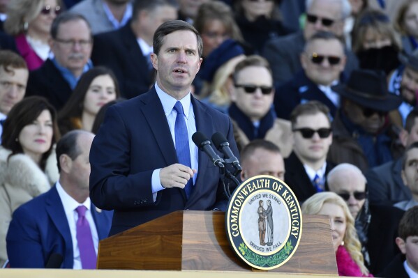 Kentucky Governor Andy Beshear speaks to the audience gathered to witness his public swearing in ceremony on the steps of the Kentucky State Capitol in Frankfort, Ky., Tuesday, Dec. 12, 2023. (AP Photo/Timothy D. Easley)