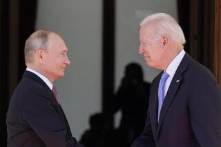 FILE - In this June 16, 2021 file photo, President Joe Biden and Russian President Vladimir Putin, arrive to meet at the 'Villa la Grange', in Geneva, Switzerland. In their search for a new approach to arms control, Moscow and Washington are likely to soon encounter an old bugaboo: Russia's demand that the U.S. stop resisting limits on its missile defenses, which the Russians view as a long-term threat and the Americans see as a deterrent to war. It is likely to arise when U.S. and Russian officials open a “strategic stability” dialogue Wednesday in Geneva — talks meant to lay the groundwork for future arms control and to reduce the risk of nuclear war. (AP Photo/Patrick Semansky)