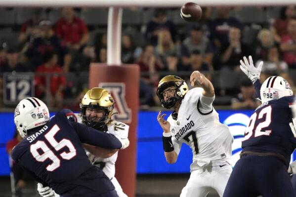 Colorado quarterback Owen McCown (7) throws a pass against Arizona during the second half of an NCAA college football game Saturday, Oct. 1, 2022, in Tucson, Ariz. (AP Photo/Rick Scuteri)