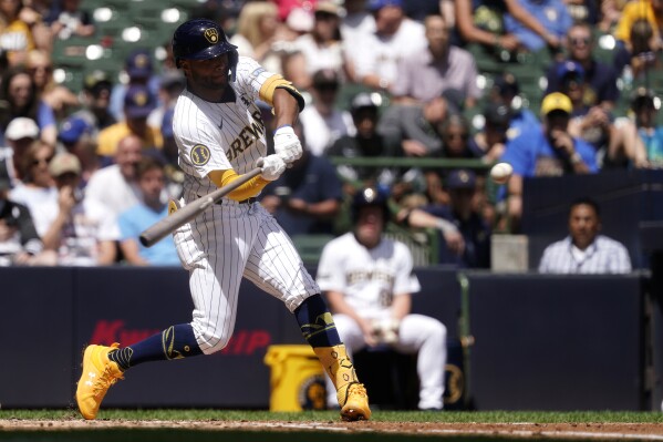 Milwaukee Brewers' Jackson Chourio hits a three-run home run during the second inning of a baseball game against the Chicago White Sox, Sunday, June 2, 2024, in Milwaukee. (AP Photo/Aaron Gash)