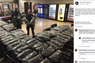 FILE - In this undated photo taken from the New York Police Department Facebook page, officers stand by what NYPD thought was marijuana when they confiscated in the Brooklyn borough of New York on Saturday, Nov. 2, 2019, at the 75th Precinct of the NYPD in New York. A day after prosecutors dropped criminal charges in a case spotlighting confusion over hemp, marijuana and conflicting laws, the Brooklyn brothers caught in the chaos took the first step toward suing the city and the police department. (New York Police Department via AP)