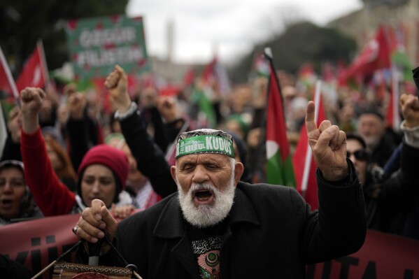 People protest in support of Palestinians in Gaza during a protest rally in Istanbul, Turkey, Saturday, Feb. 17, 2024, amid the ongoing war between Israel and Hamas. (AP Photo/Khalil Hamra)