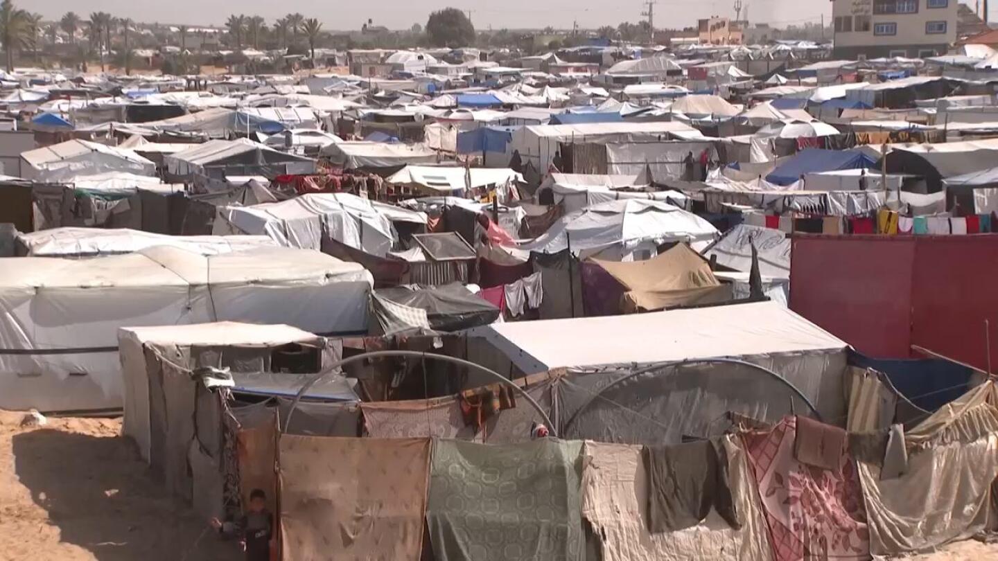 Displaced Palestinians hope for end to war in Gaza as Israel announces intention cut off Rafah