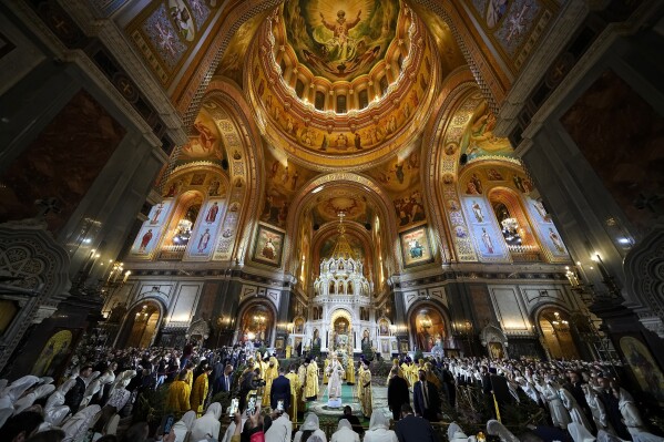 FILE - Russian Orthodox Patriarch Kirill, center, delivers the Christmas service in the Christ the Saviour Cathedral in Moscow, Russia, Friday, Jan. 6, 2023. While much of the world has Christmas in the rearview mirror by now, people in some Eastern Orthodox traditions will celebrating the holy day on Sunday. Jan. 7, 2024. (AP Photo/Alexander Zemlianichenko, Pool, File)