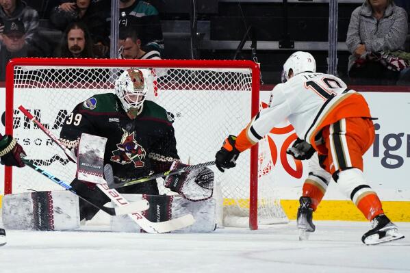 Arizona Coyotes goaltender Connor Ingram (39) makes a save on a shot by Anaheim Ducks right wing Troy Terry (19) during the first period of an NHL hockey game in Tempe, Ariz., Tuesday, Jan. 24, 2023. (AP Photo/Ross D. Franklin)