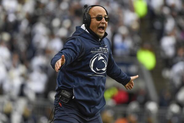 FILE - Penn State coach James Franklin reacts during the team's NCAA college football game against Rutgers in State College, Pa., Saturday, Nov. 20, 2021.  Franklin and Arkansas coach Sam Pittman are concentrating on the players who actually will be on the field for Penn State and No. 22 Arkansas in the Outback Bowl on New Year’s Day Outback.  (AP Photo/Barry Reeger, File)