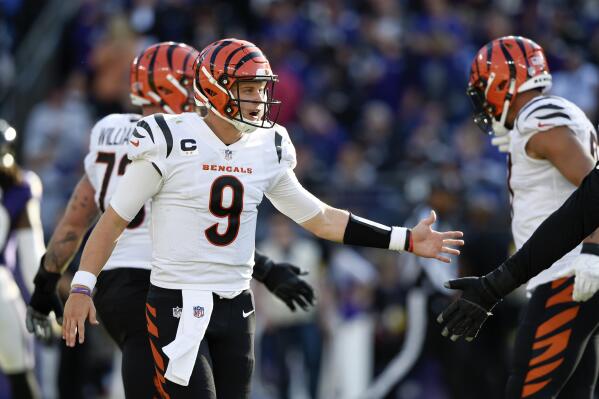 Ravens out to extend playoff road record against Burrow's Bengals