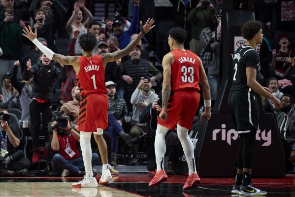 Portland Trail Blazers guard Anfernee Simons (1) gestures after hitting the go-ahead basket against the Brooklyn Nets during the final second of an NBA basketball game in Portland, Ore., Wednesday, Jan. 17, 2024. (AP Photo/Craig Mitchelldyer)