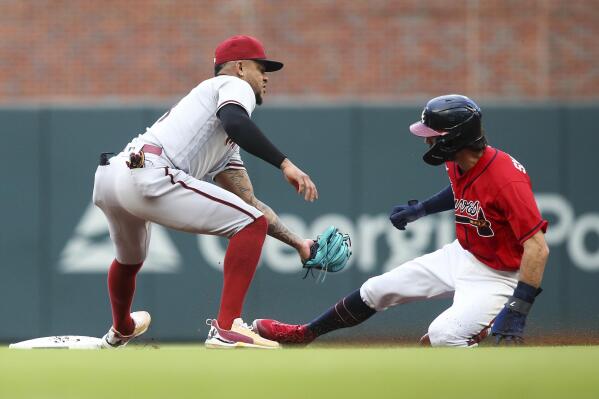 Riley's hot bat, Wright's 13th win lead Braves past D-backs