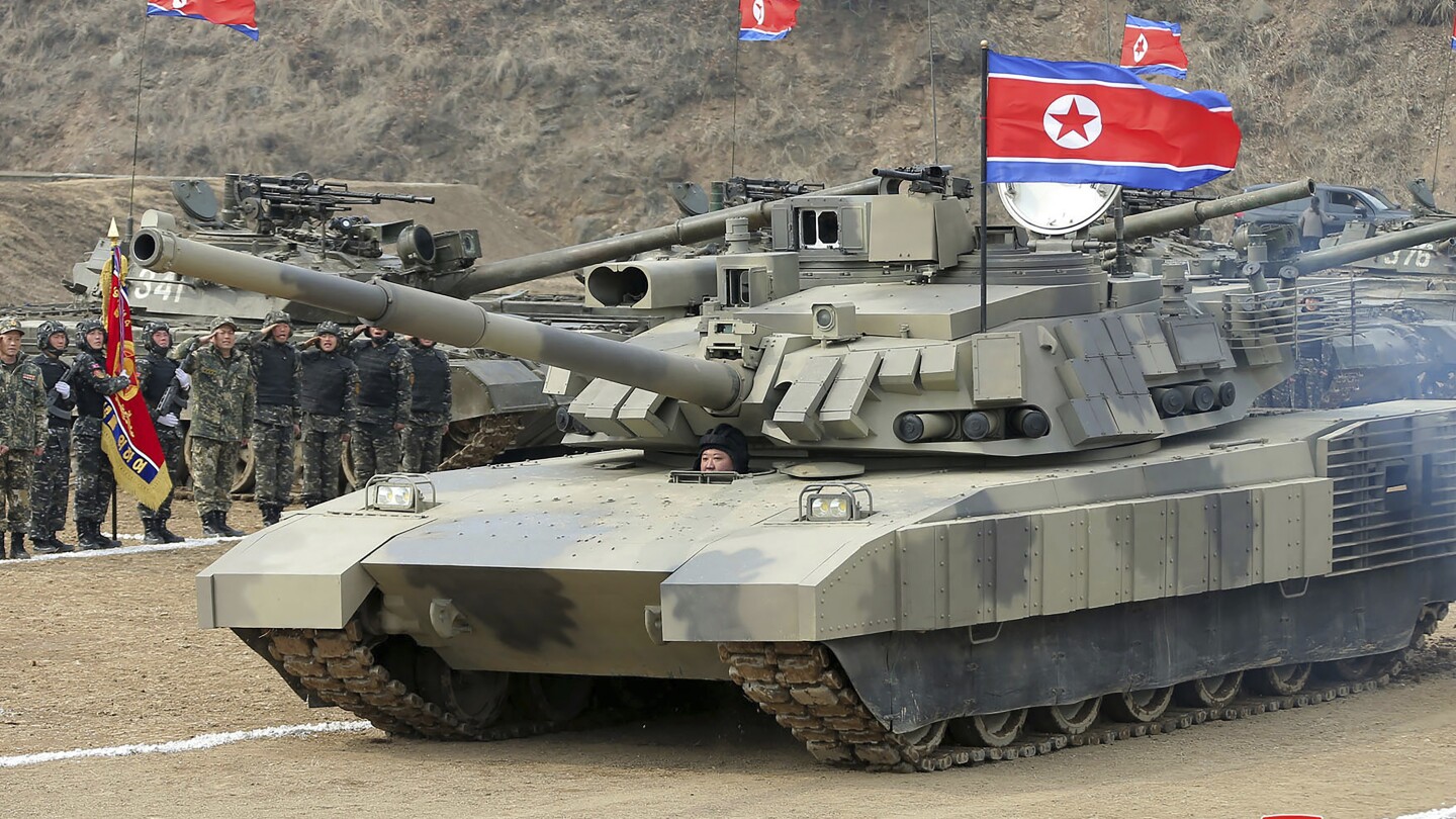 North Korean Leader Kim Jong Un Drives Tank and Oversees Military Drill