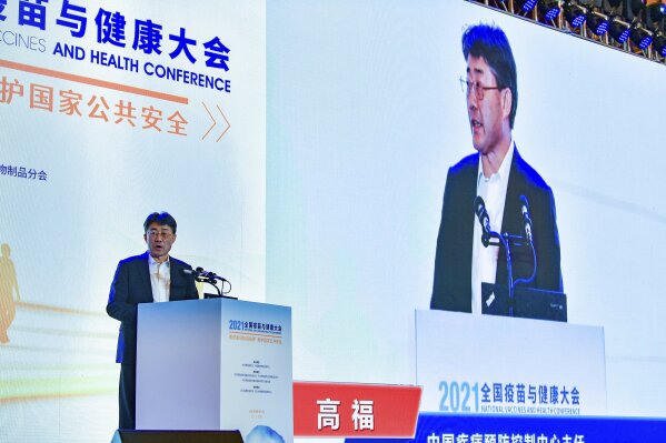 Gao Fu, director of the China Centers for Disease Control, speaks at the National Vaccines and Health conference in Chengdu in southwest China's Sichuan province Saturday, April 10, 2021. In a rare admission of the weakness of Chinese coronavirus vaccines, Gao the country's top disease control official says their effectiveness is low and the government is considering mixing them to give them a boost. (Chinatopix Via AP)