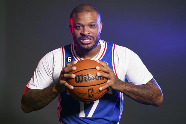 FILE -Philadelphia 76ers' P.J. Tucker poses for a photograph during media day at the NBA basketball team's practice facility, Monday, Sept. 26, 2022, in Camden, N.J. The Philadelphia 76ers are counting on P.J. Tucker to bring them a needed toughness.  Sixers star Joel Embiid campaigned for the team to sign a player like Tucker after they lost to the Heat in the playoffs. (AP Photo/Chris Szagola, File)