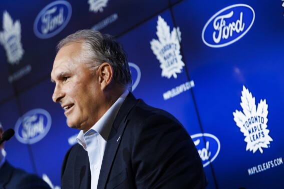 Toronto Maple Leafs NHL hockey team new head coach Craig Berube speaks during his introductory press conference in Toronto, Tuesday, May 21, 2024. (Cole Burston/The Canadian Press via AP)