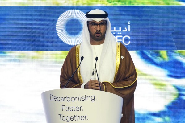 Sultan al-Jaber, the COP28 President-Designate and UAE's Special Envoy for Climate Change, talks during the ADIPEC. Oil and Energy exhibition and conference in Abu Dhabi, United Arab Emirates, Monday, Oct. 2, 2023. Sultan al-Jaber called on oil and gas companies on Monday to be "central to the solution" to fighting climate change, even as the industry boosts its production to enjoy rising global energy prices. (AP Photo/Kamran Jebreili)