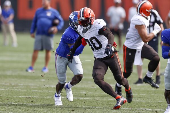 Cleveland Browns wide receiver Jarvis Landry (80) goes out for a pass against New York Giants cornerback Darnay Holmes (30) during a joint NFL football training camp practice Thursday, Aug. 19, 2021, in Berea, Ohio. (AP Photo/Ron Schwane)