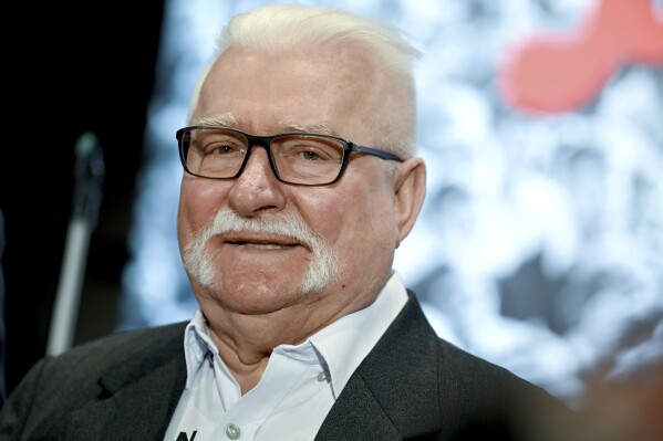 FILE - Lech Walesa former President of Poland, speaks after being awarded withthe "Golden Medal for services to reconciliation and understanding among peoples" in Berlin, Monday Sept. 26, 2022. Poland’s former president and Nobel Peace Prize winner, 80-year-old Lech Walesa has been hospitalized with a bad case of COVID-19, an aide said Tuesday, Dec. 5, 2023. (Britta Pedersen/dpa via AP, file)