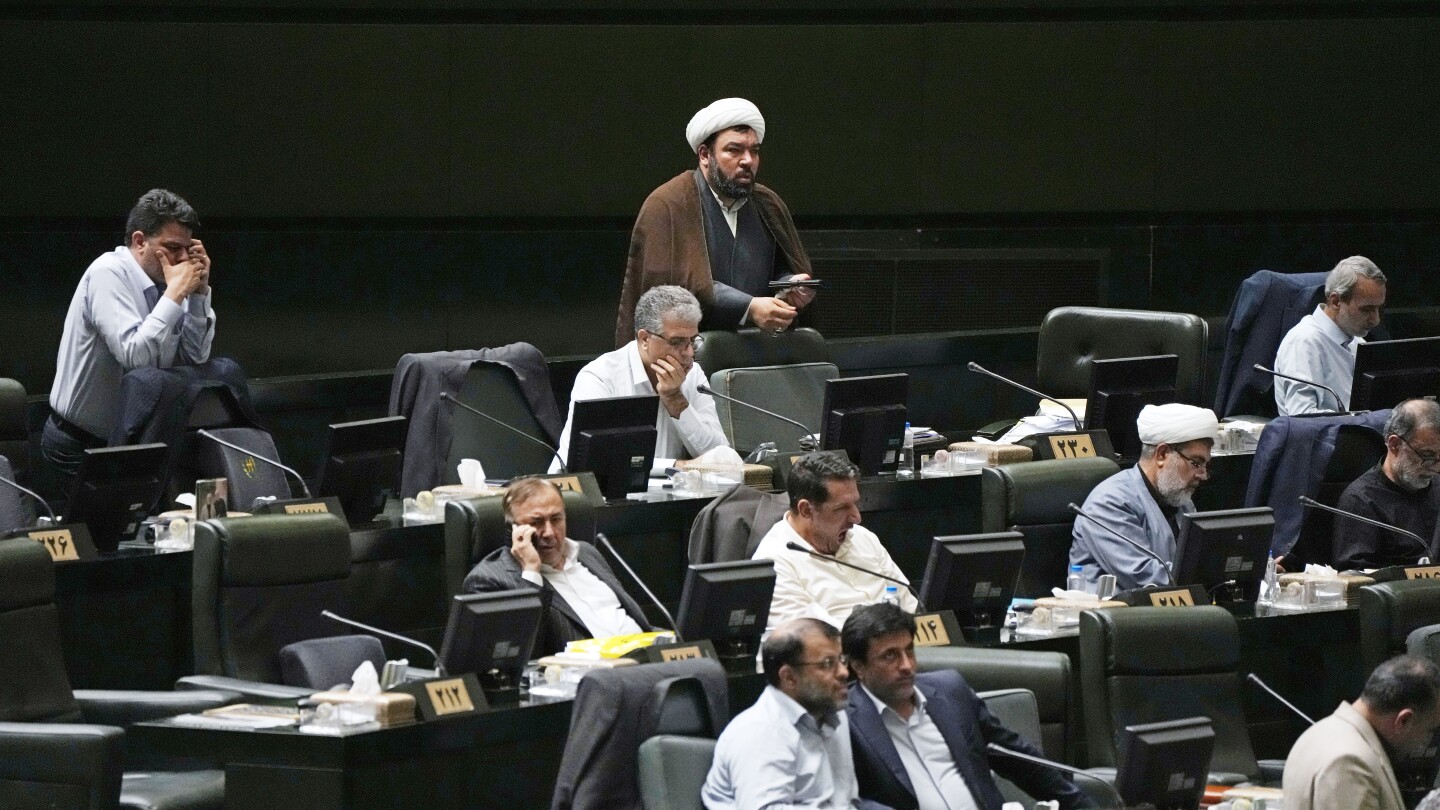 Iran’s hard-line parliament approves all members of president’s Cabinet, first time since 2001