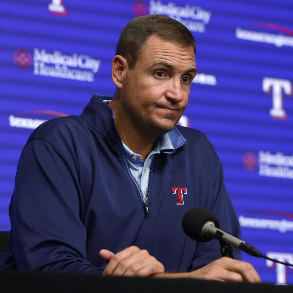 Chris Young moves on as Rangers GM without mentor Daniels | AP News