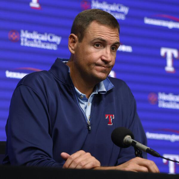 Texas Rangers General Manager Chris Young presents newly signed