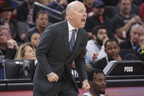 UCLA coach Mick Cronin shouts during the first half of the team's NCAA college basketball game against Arizona for the championship of the men's Pac-12 Tournament, Saturday, March 11, 2023, in Las Vegas. (AP Photo/Chase Stevens)