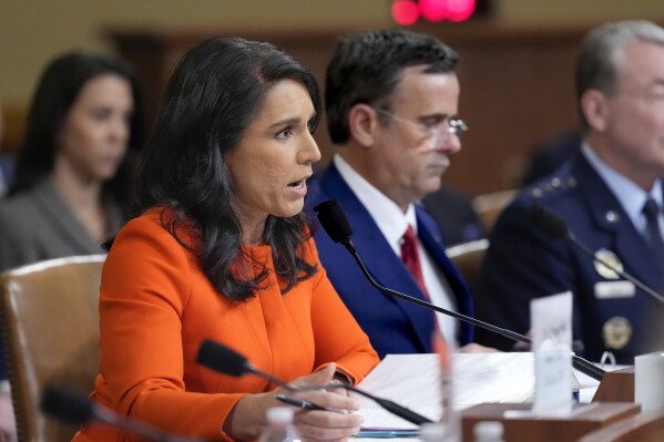 Director of National Intelligence Tulsi Gabbard, left, joined by CIA Director John Ratcliffe, testifies as the House Intelligence Committee holds a hearing on worldwide threats, at the Capitol, in Washington, March 26, 2025. (AP Photo/J. Scott Applewhite, File)