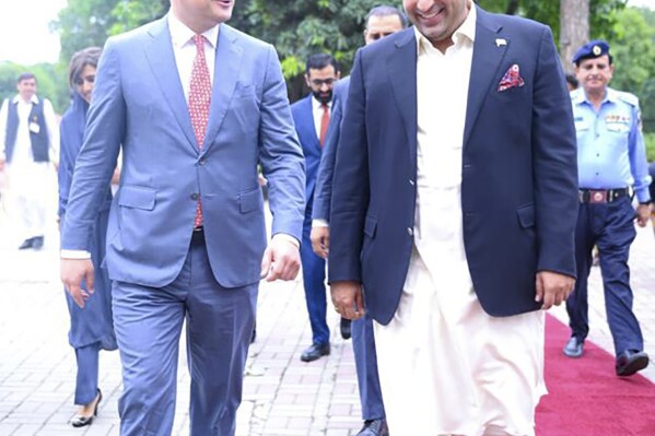 In this handout photo released by Pakistan Foreign Ministry Press Service, Pakistan's Foreign Minister Bilawal Bhutto Zardari, right, receives Ukraine's Foreign Minister Dmytro Kuleba, at the foreign ministry in Islamabad, Pakistan, Thursday, July 20, 2023. (Pakistan Foreign Ministry Press Service via AP)