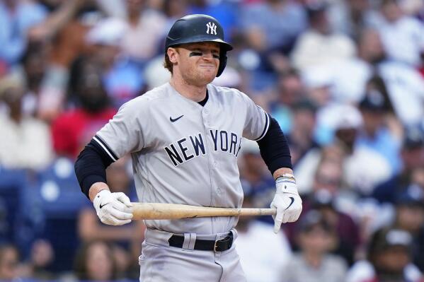 FILE - New York Yankees' Clint Frazier reacts after striking out against Philadelphia Phillies pitcher Aaron Nola during the eighth inning of a baseball game June 13, 2021, in Philadelphia.  Frazier's tenure with the Yankees may have ended after five unfulfilling seasons when New York designated him for assignment Friday, Nov. 19, to open a roster spot for a prospect ahead of the winter meeting draft. (AP Photo/Matt Slocum, File)