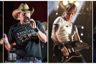 This combination photo shows CMT Artists of the Year honorees, Chris Stapleton, from left, Jason Aldean, Kieth Urban and Luke Bryan. CMT is forgoing formal award presentations and devoting the entire live show to “a night of hope and healing through the power of music” following a mass shooting at a country music festival in Las Vegas. (AP Photo/File)